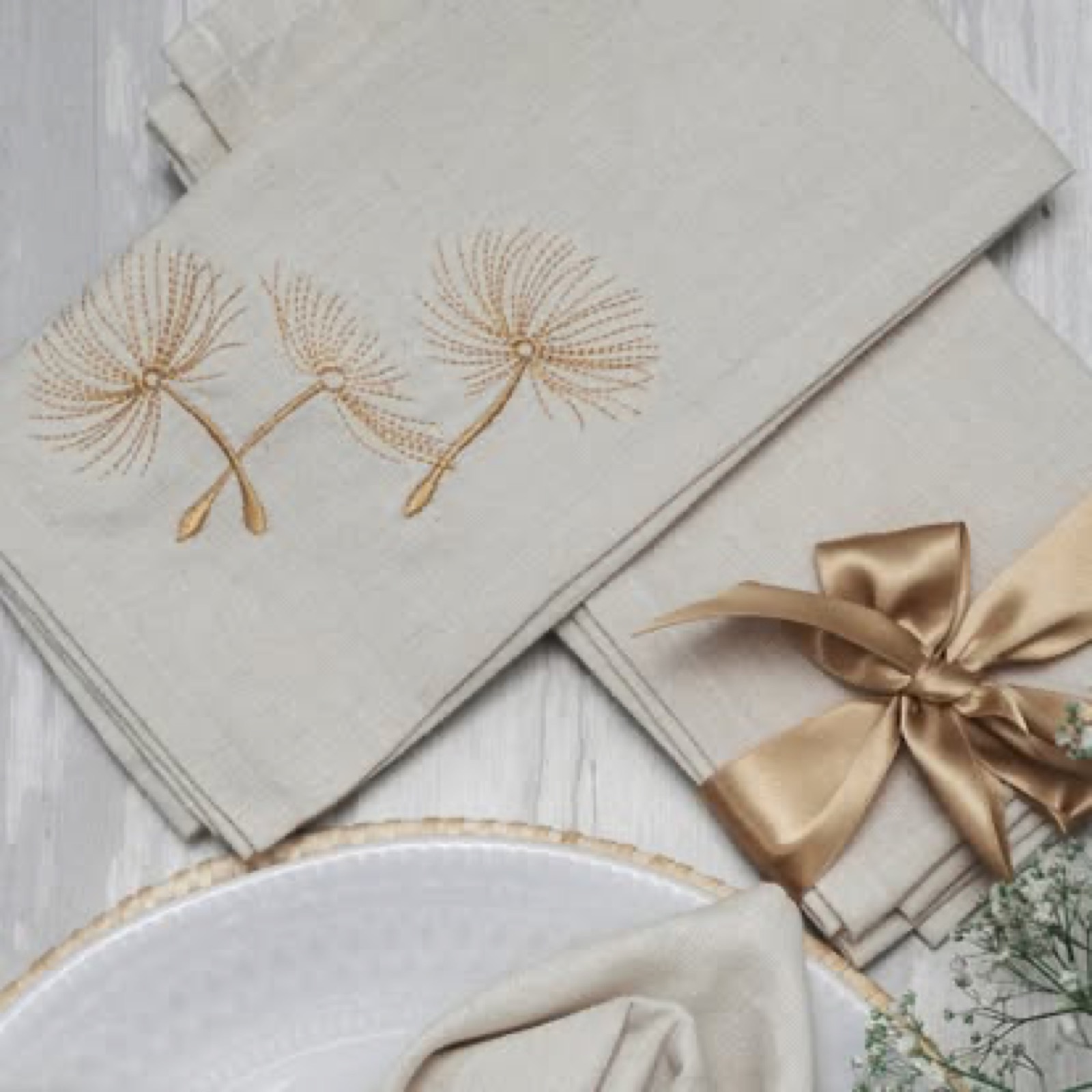 Melchiah neutral table linen with fine gold botanical embroidery